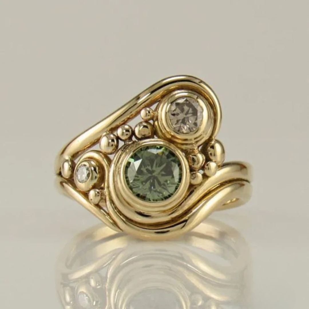 Vintage-style gold and green zircon ring