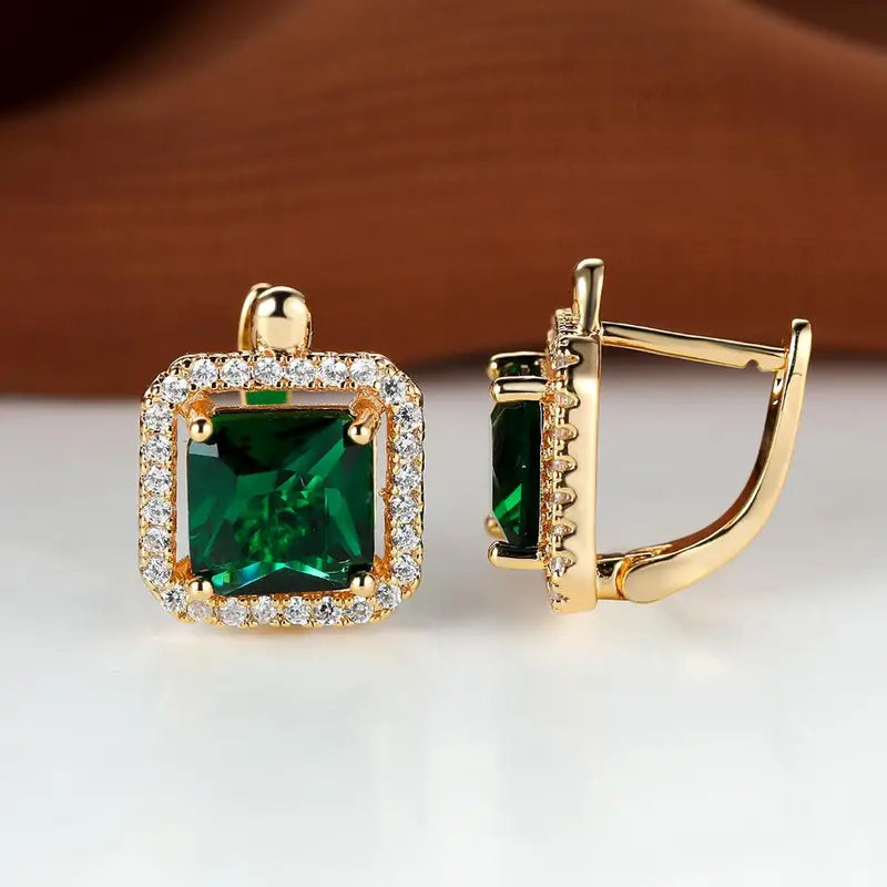Gold earrings with golden green square zircon