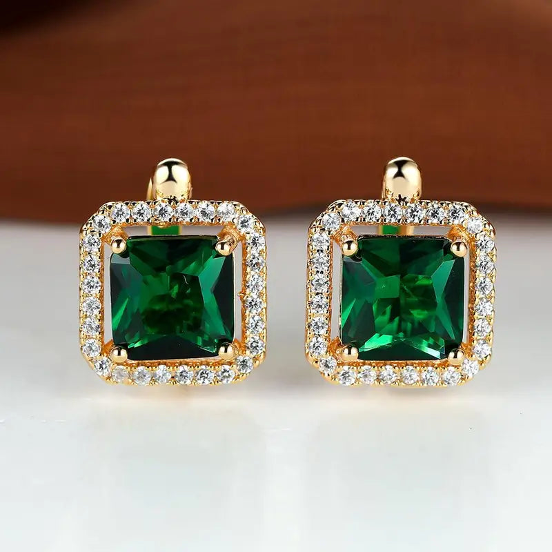 Gold earrings with golden green square zircon