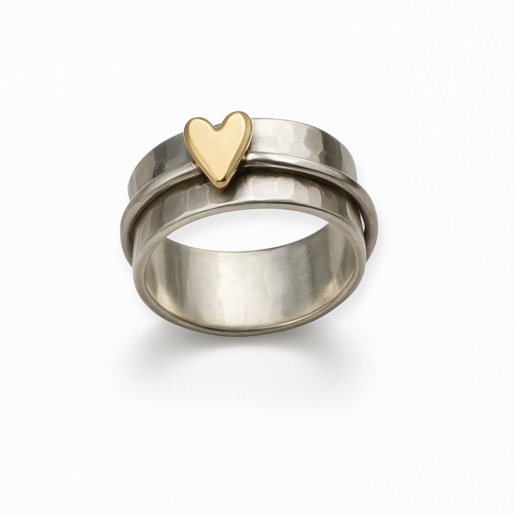 Silver ring with vintage gold heart