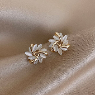 Elegant gold earrings with white opals