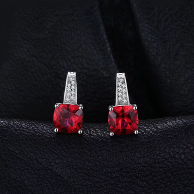 Rhodium-plated steel round ruby ​​stud earrings